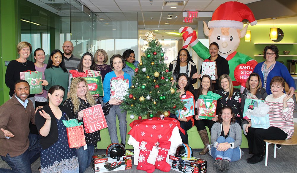 delta community employees donating toys for tots