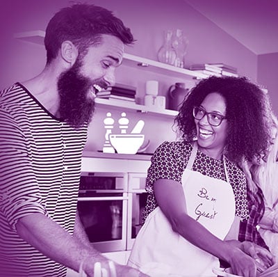 man and woman cooking