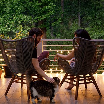 couple sitting on porch at home