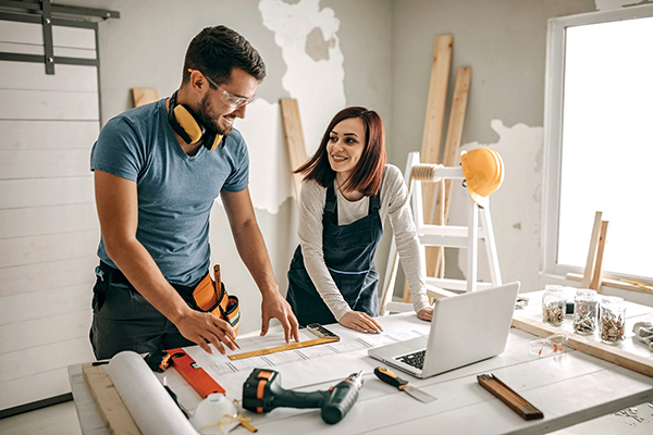 young couple working on home renovations