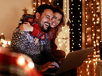 young couple looking at laptop